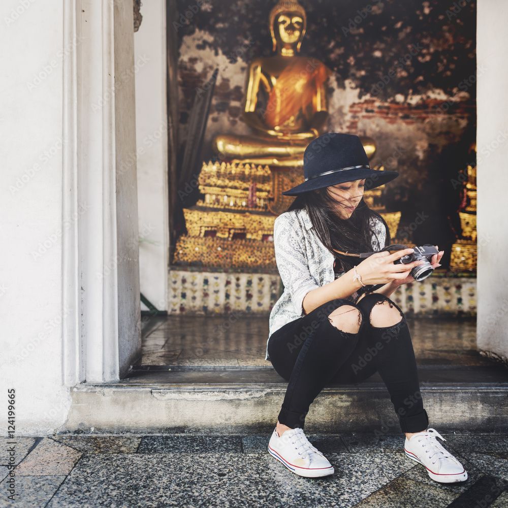 Woman Sitting Checking Photo Concept