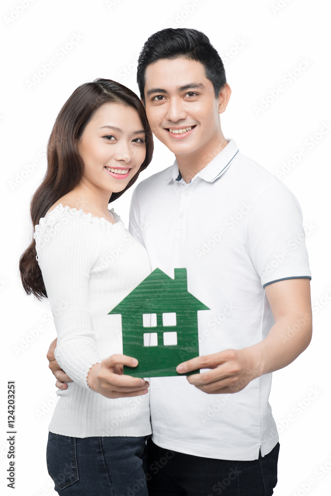 real estate, family and couple concept - smiling couple hugging