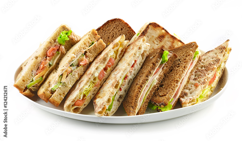 plate of various triangle sandwiches