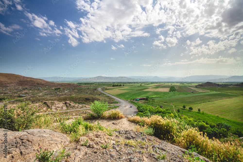 View on road and blue sky with clouds in Armenia