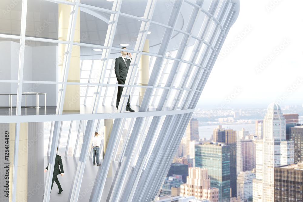 Businessmen inside glass building