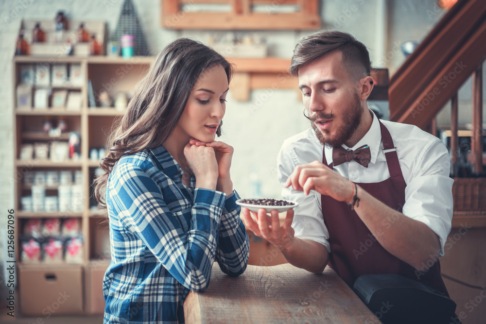 Barista with customer