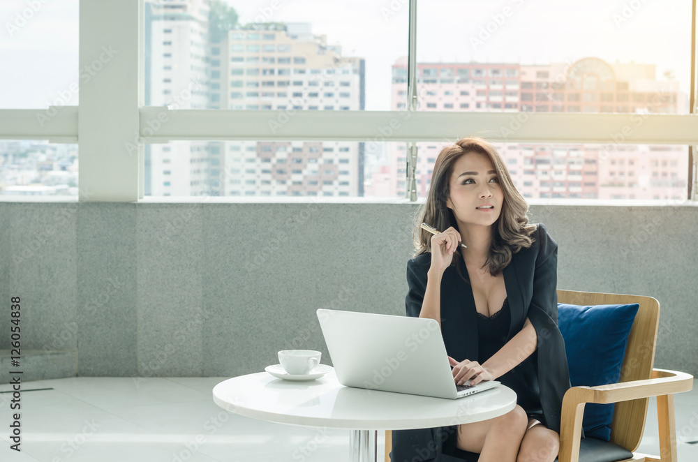 Beautiful businesswoman working at office