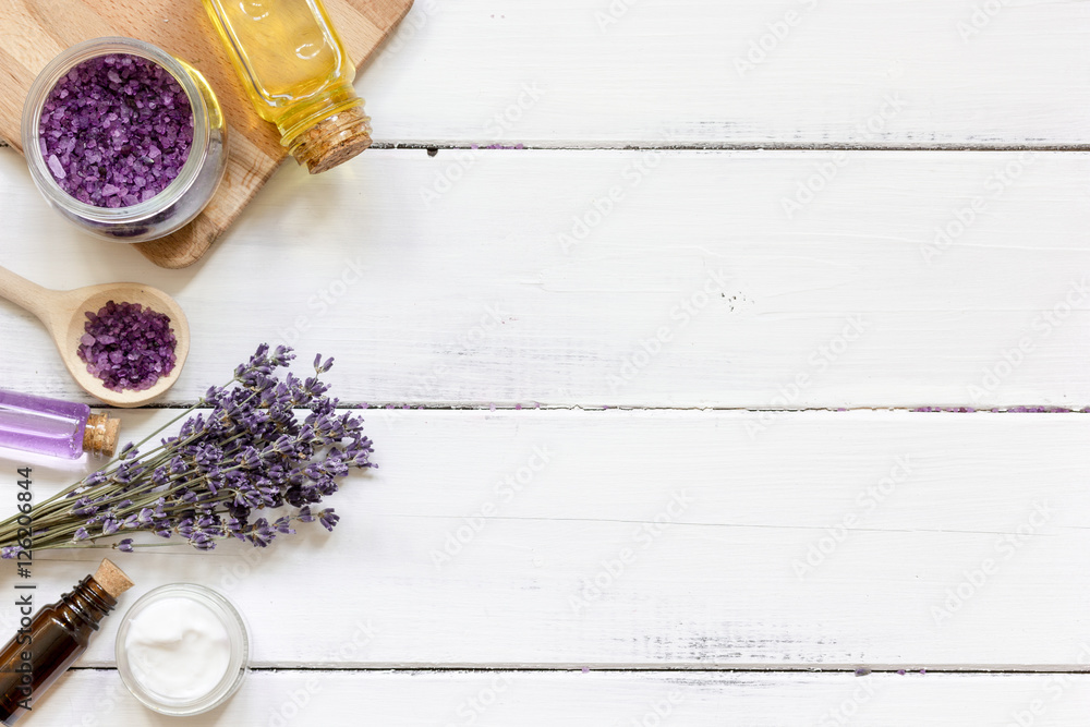 natural creams with lavender flowers on wooden table