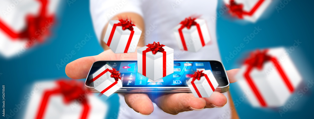 Man celebrating christmas holding gift in his hand