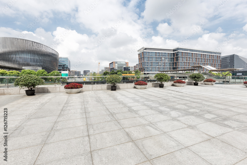 modern buildings in shanghai from empty brick floor