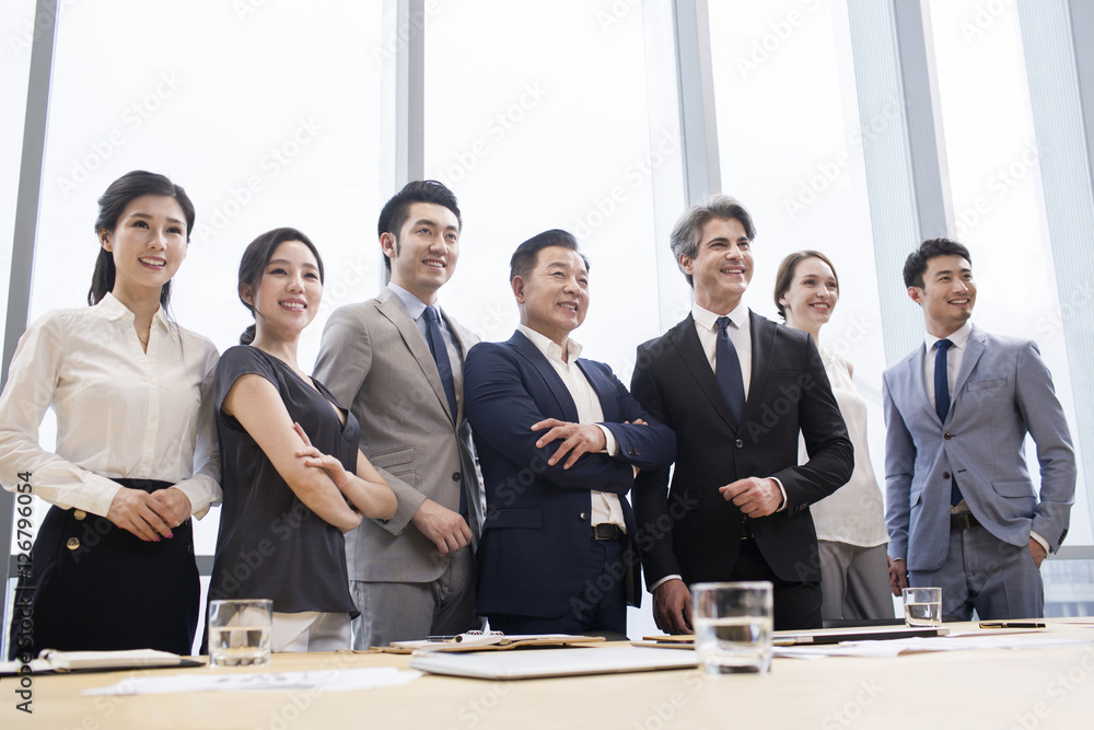 Confident business people in meeting room