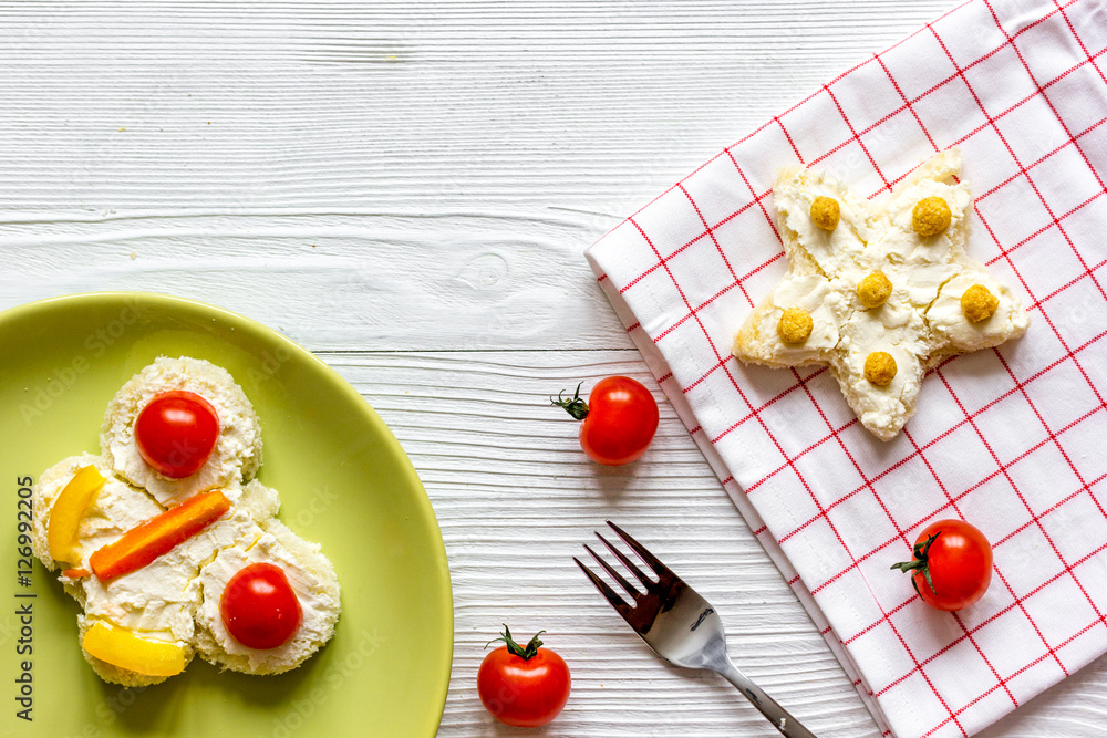 kid breakfast butterfly sandwiches top view on wooden background