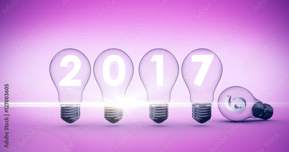 Composite image of light bulbs with 2017 over white background