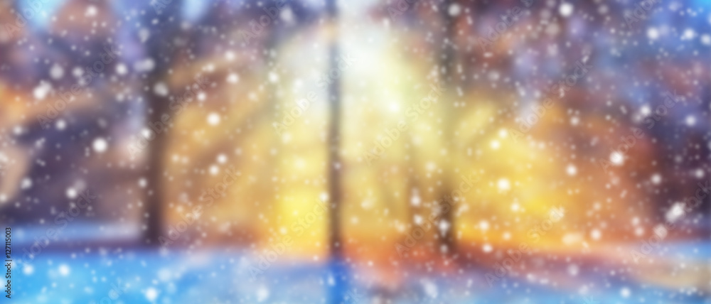 Abstract blur winter background with snow flakes