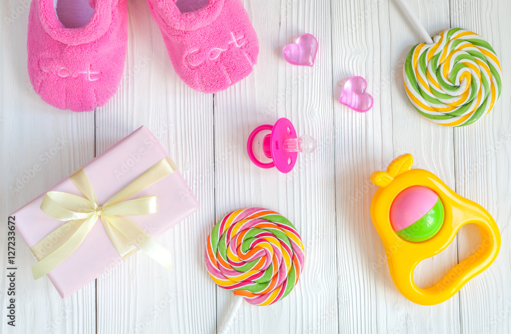 birth of child - lollipop on wooden background