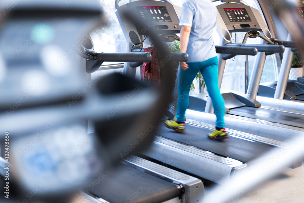 equipment with people in modern gym