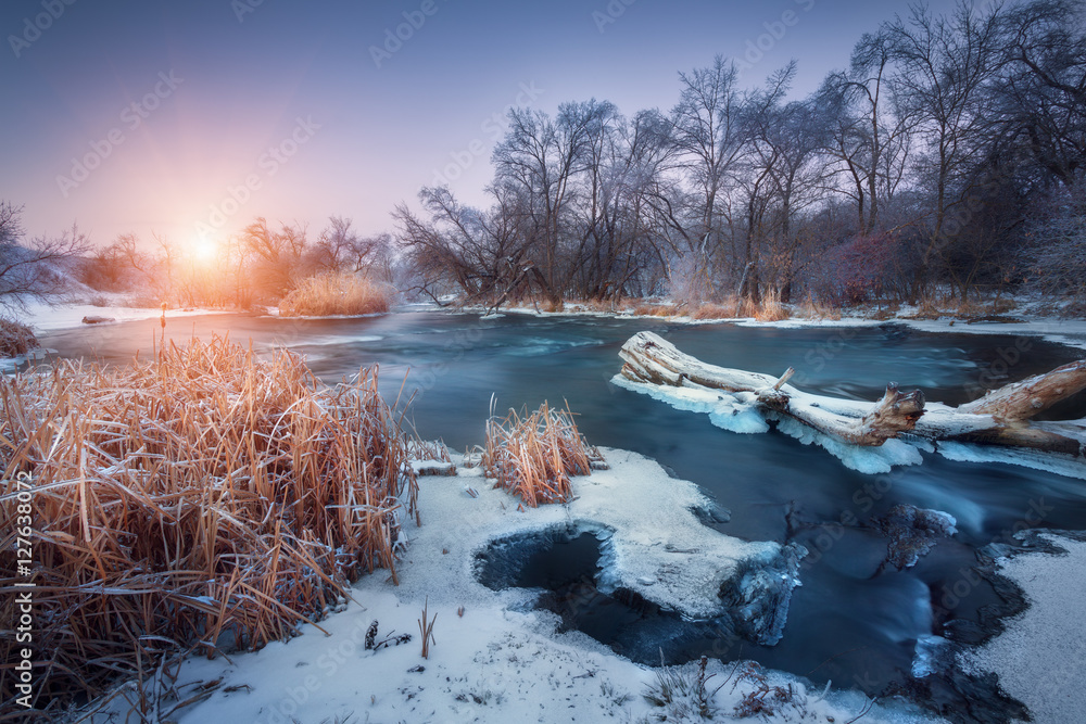 Christmas background with snowy forest. Winter landscape with snowy trees, beautiful frozen river an