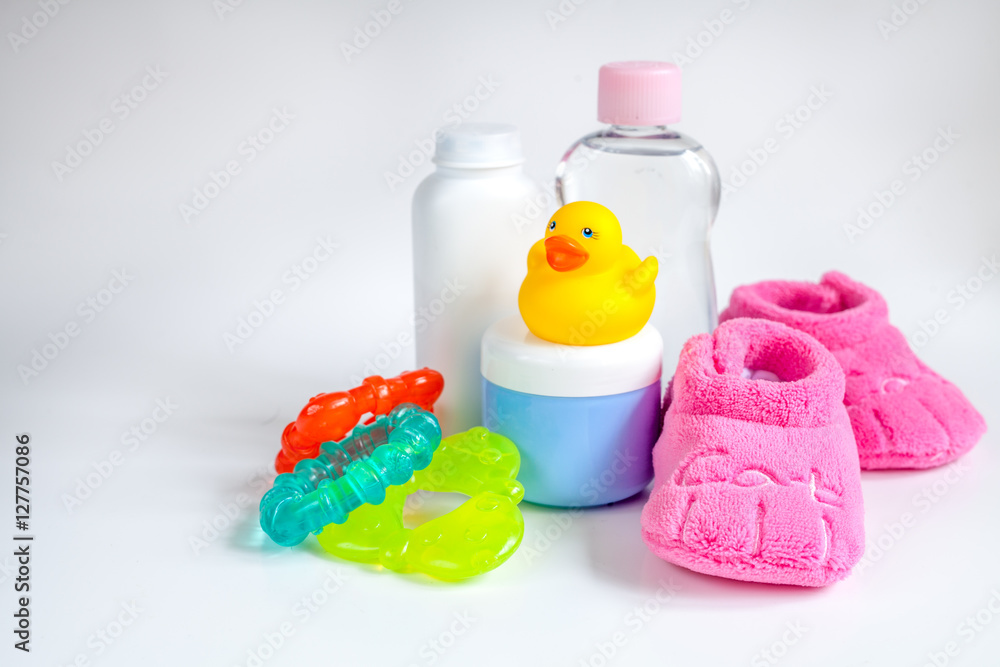 baby accessories for bath with duck on white background