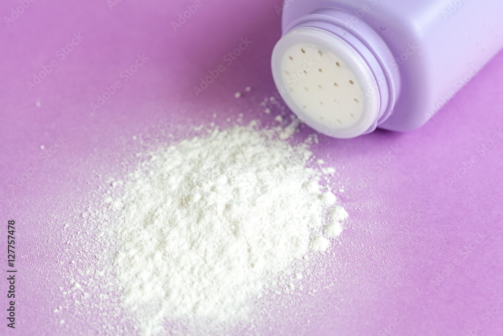 baby powder on purple background