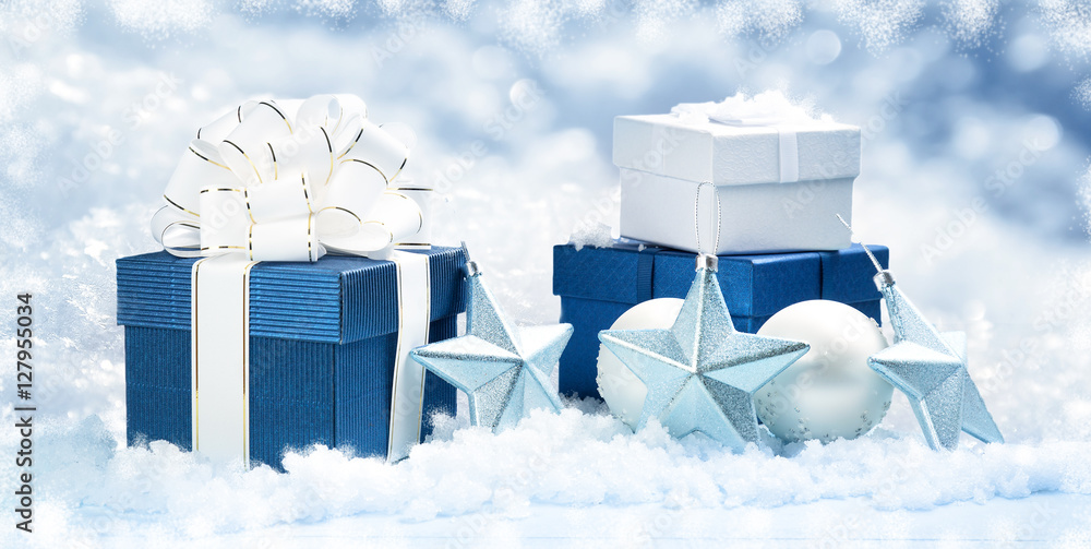 Blue gift boxes with christmas decoration on beautiful background