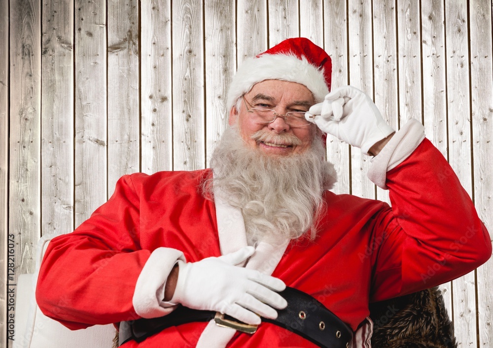 Portrait of happy santa wearing spectacles