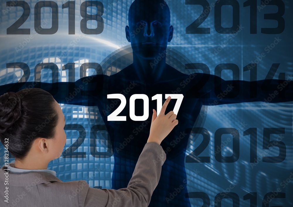 Woman touching 2017 on digitally generated human body silhouette