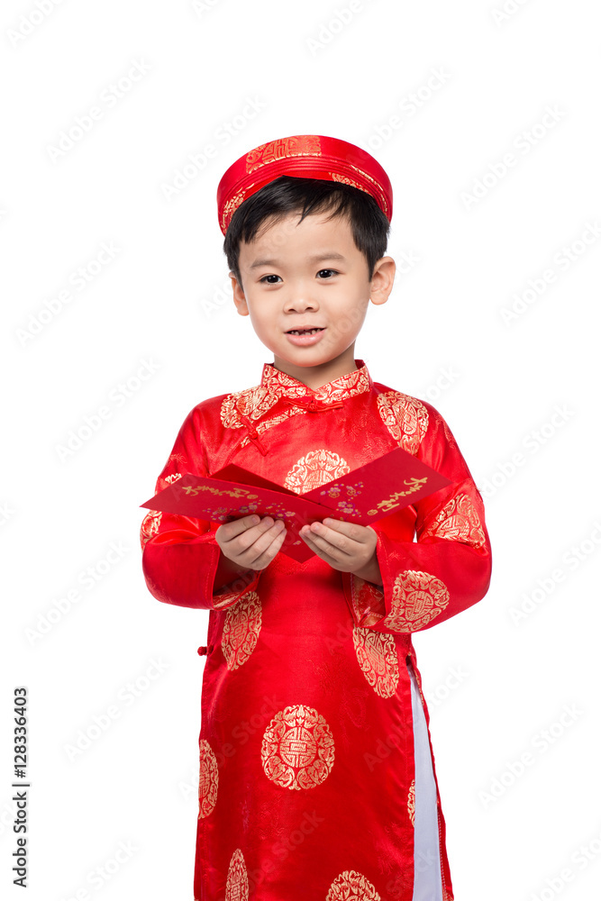 Little Vietnamese boy holding red envelops for Tet. The word mea