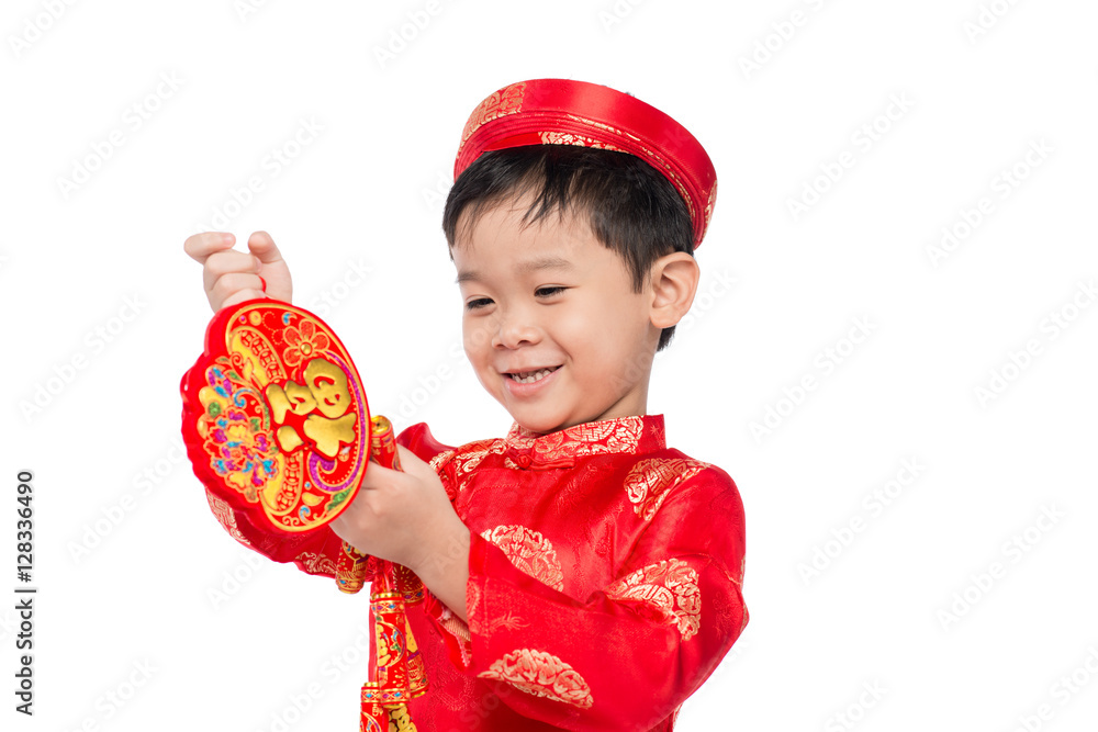 Portrait of a funny and exciting Vietnamese boy with firecracker