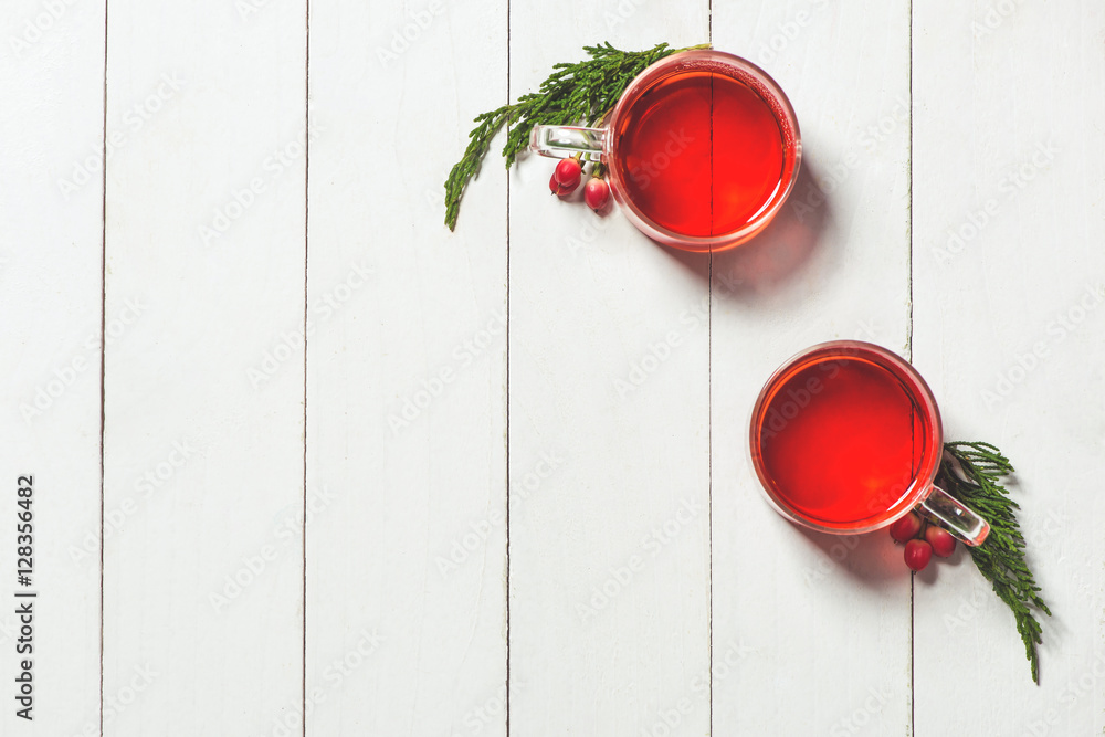 Glass cup of tea on wood table