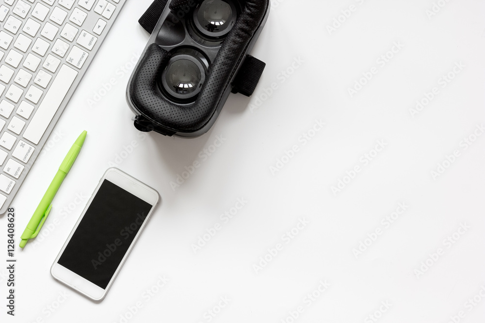 virtual reality glasses with smartphone, keyboard on white background