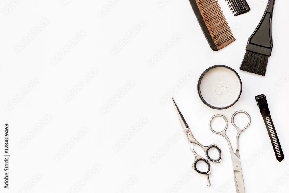 hairdresser tools on white background top view