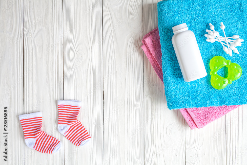 baby accessories for bath on wooden background