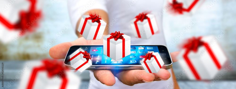 Man celebrating christmas holding gift in his hand