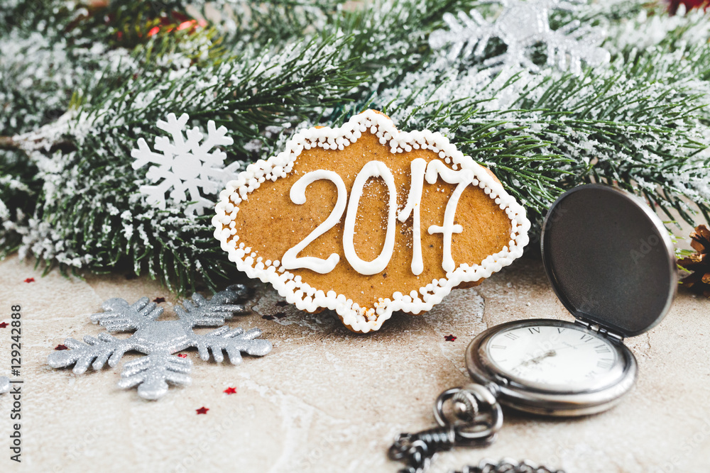 gingerbread and clock on background of christmas toys