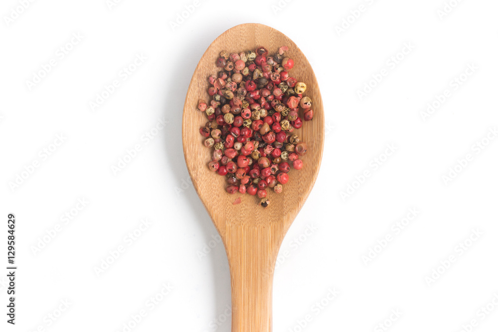 Brazilian Pink Pepper into a spoon