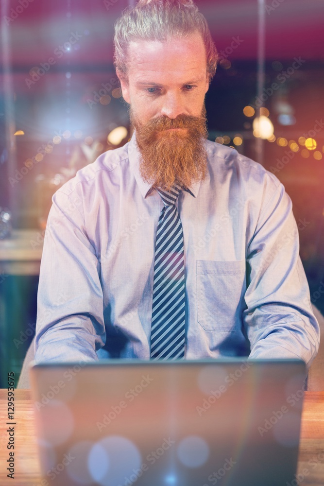 Businessman using laptop