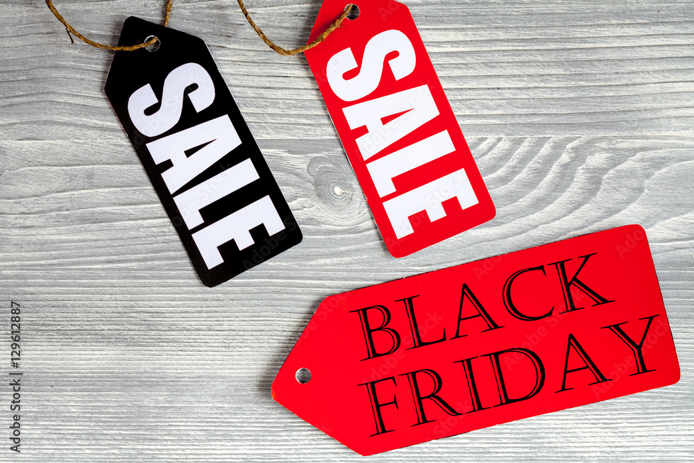 concept black friday on wooden background top view