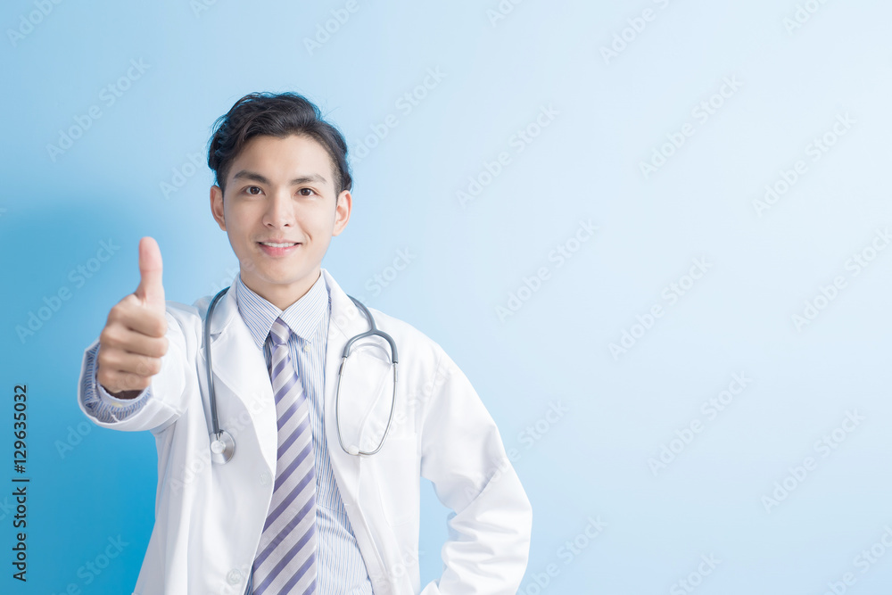 Male doctor show thumb up