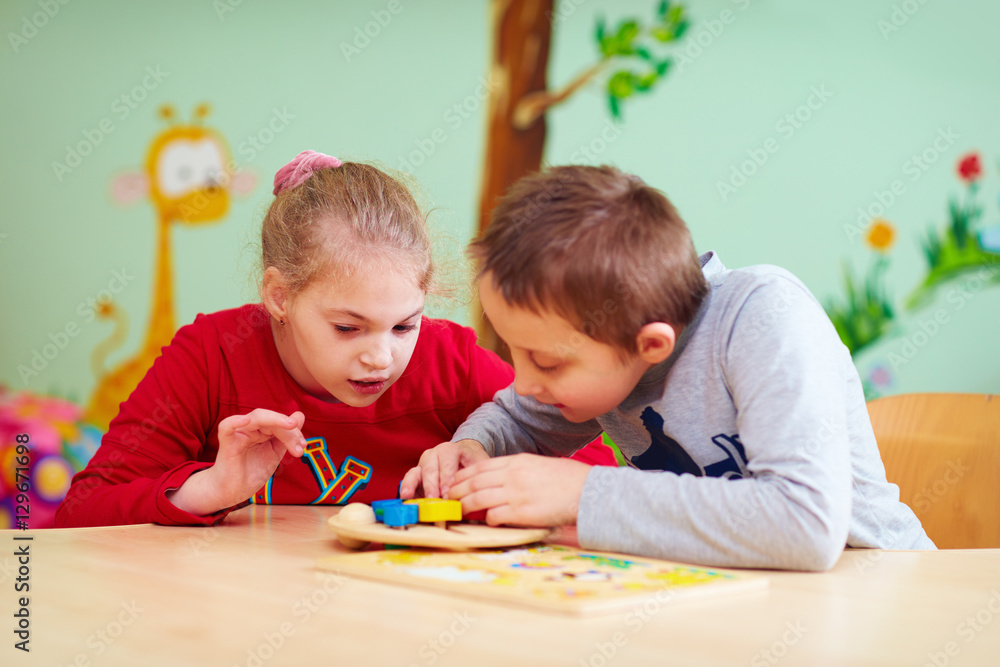 kids with special needs develop their fine motility in daycare rehabilitation center