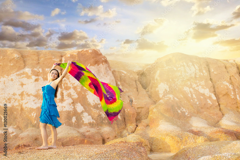 Asian young woman with canyon background.