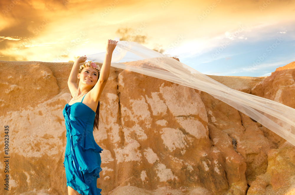 Asian young woman with canyon background. 