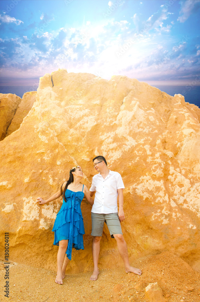 Asian couple hugging with canyon background. Valentines day concept