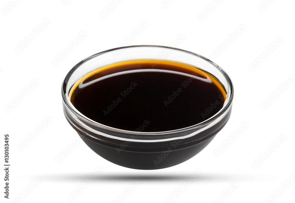 Soy sauce in glass bowl isolated on white background, with clipping path