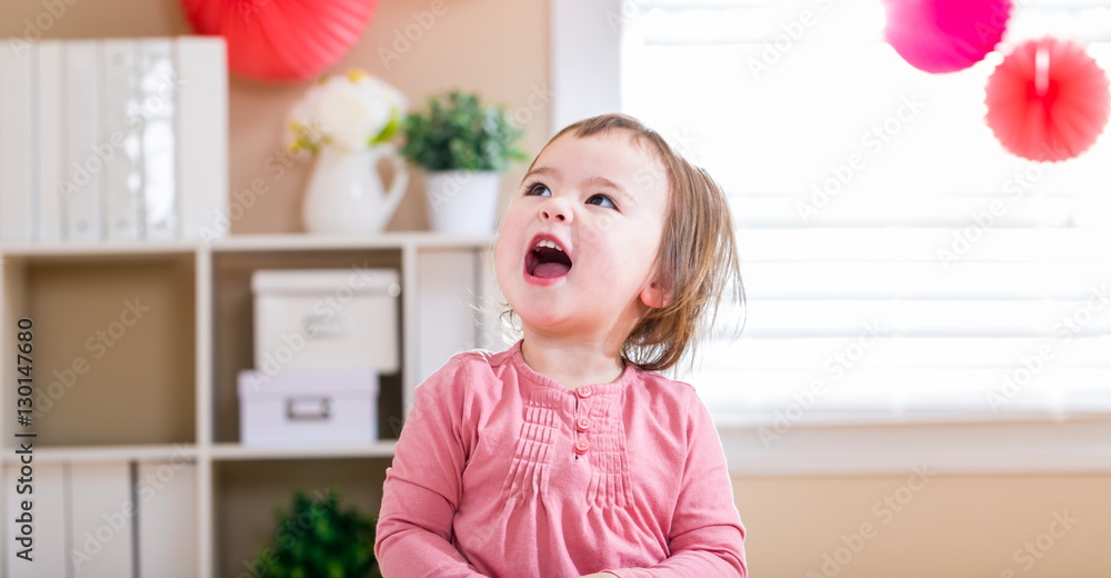 Happy toddler girl smiling