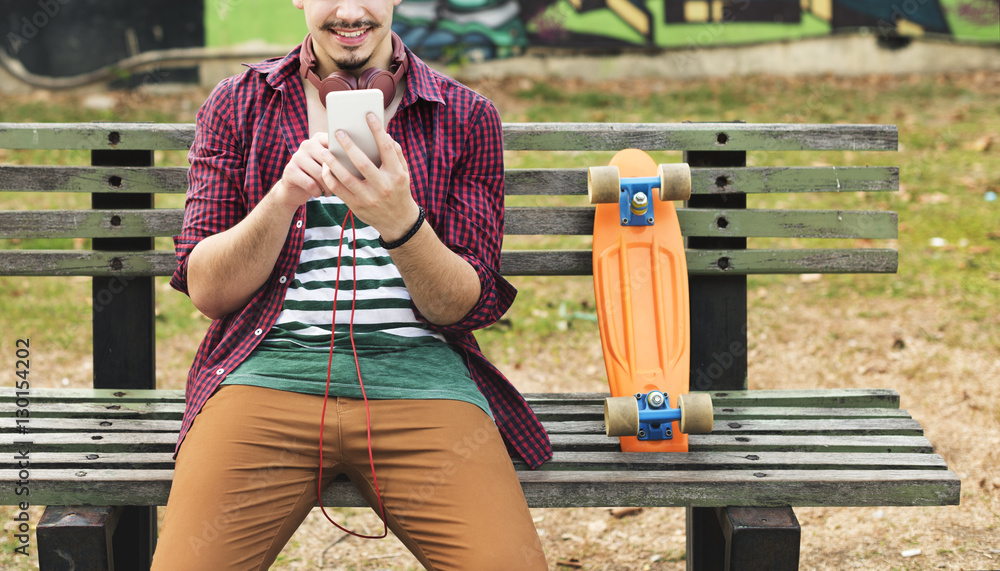 Skateboarding Sitting Relaxation Park Holiday Concept