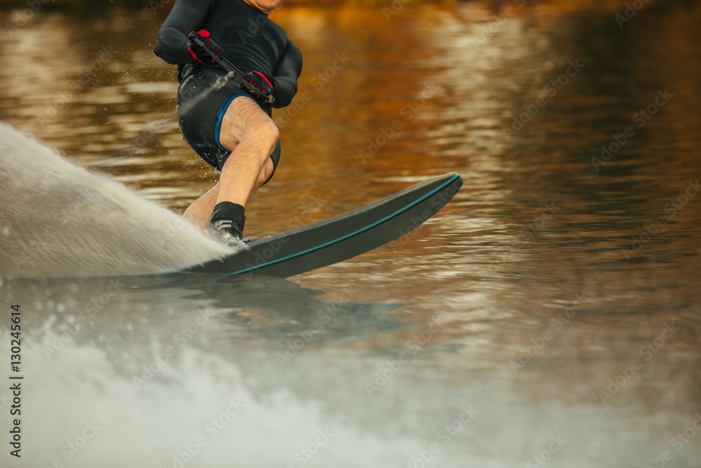 Man riding wakeboard on a lake