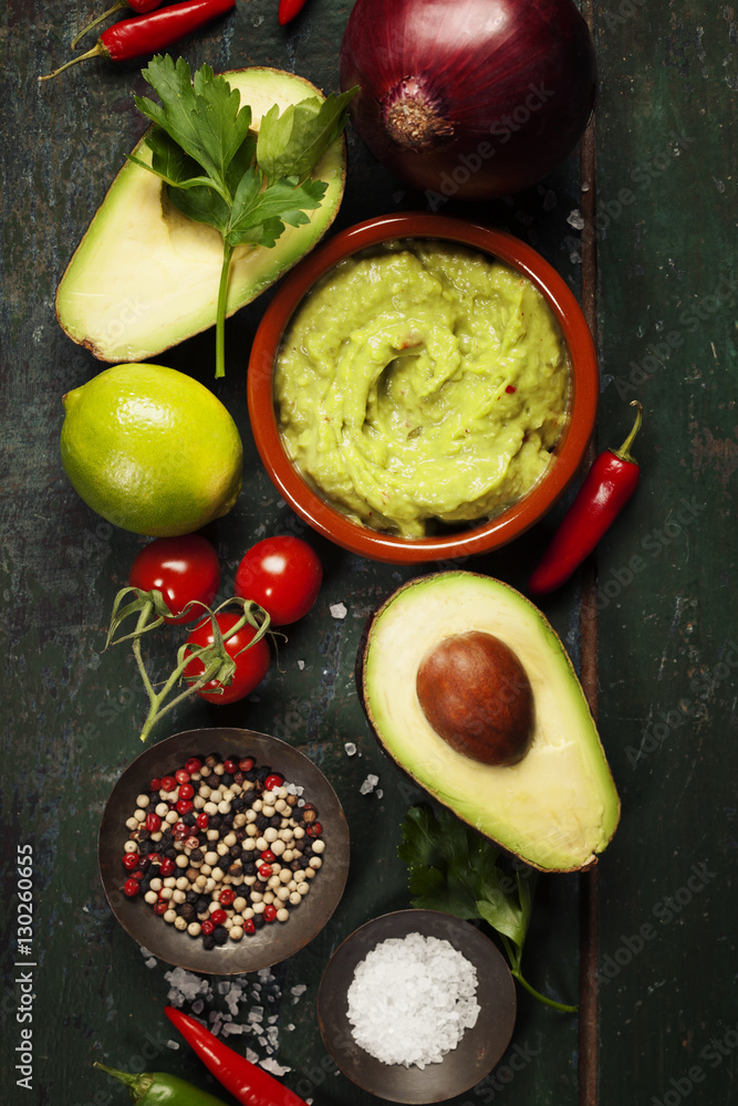 Bowl of guacamole with fresh ingredients