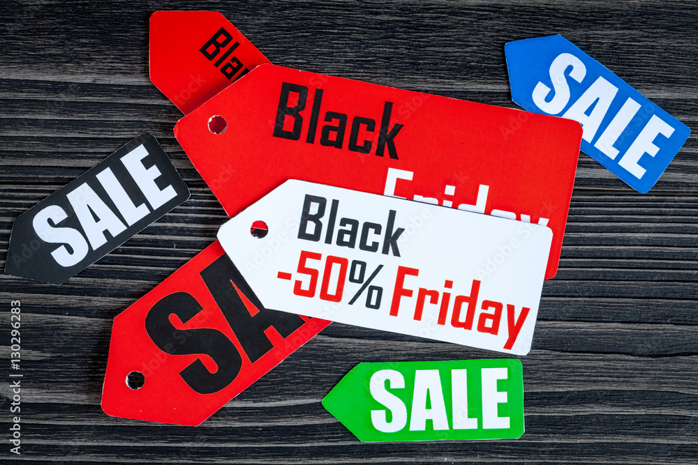 concept black friday on dark wooden background top view