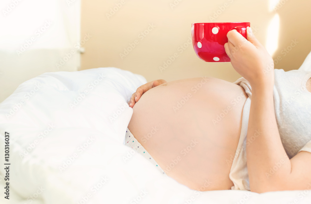 Pregnant young woman relaxing