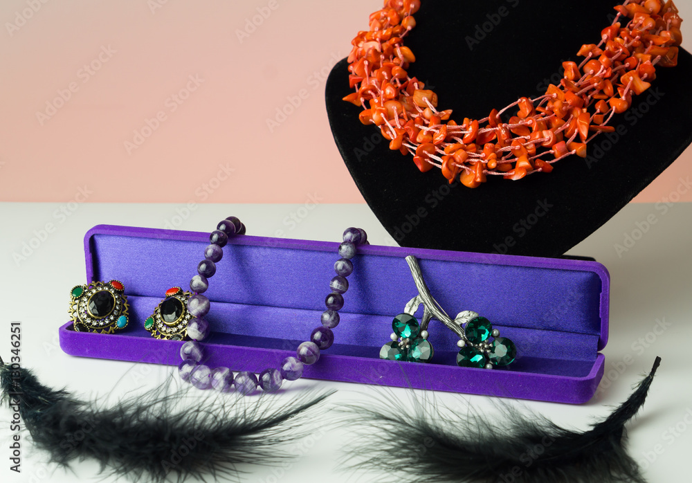 Fashion jewelry and different beads composition. Amethyst, pearl, coral, agate, etc.