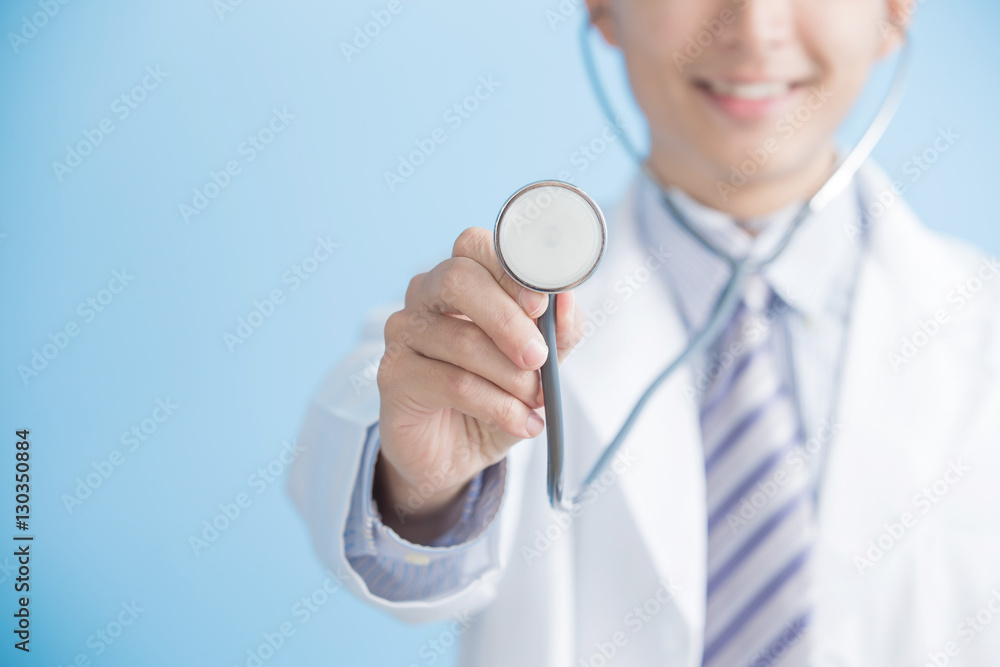 male doctor show stethoscope