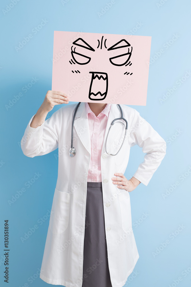 woman doctor show angry billboard