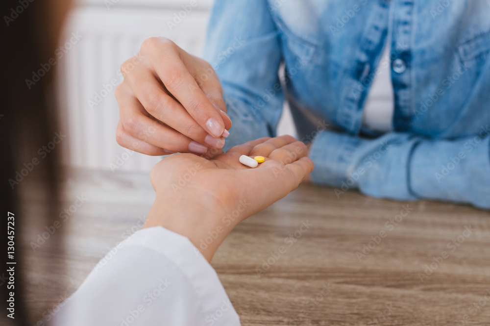 Medical female doctor giving pills