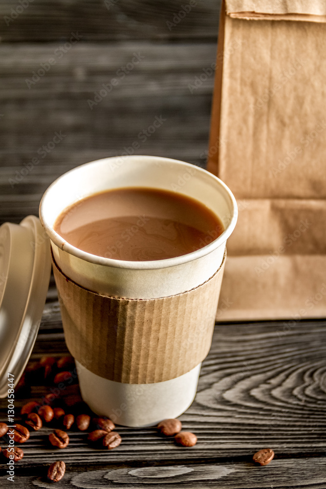 coffee cup take away at wooden background